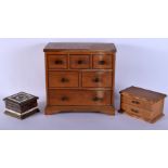 A VINTAGE APPRENTICE MADE PINE CHEST OF DRAWERS and two jewellery boxes. Largest 30 cm x 28 cm. (3)