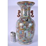A FINE LARGE 19TH CENTURY CHINESE CANTON FAMILLE ROSE VASE Qing, painted with figures within landsca