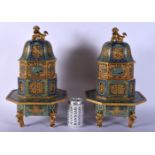 A FINE PAIR OF EARLY 20TH CENTURY CHINESE CLOISONNE ENAMEL CENSERS AND COVERS Late Qing/Republic, de