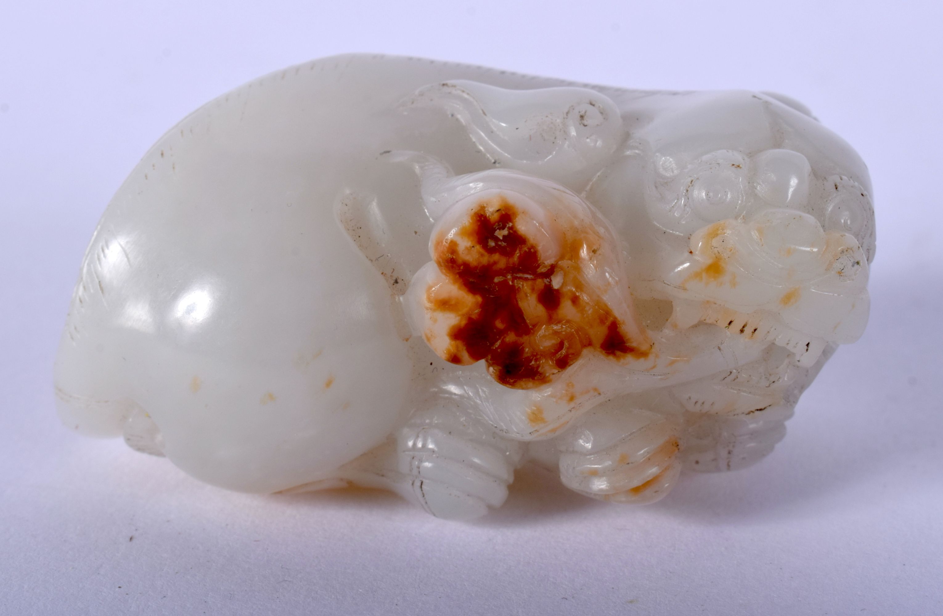 A CHINESE CARVED WHITE JADE FIGUE OF A BEAST 20th Century. 5 cm x 2.5 cm.