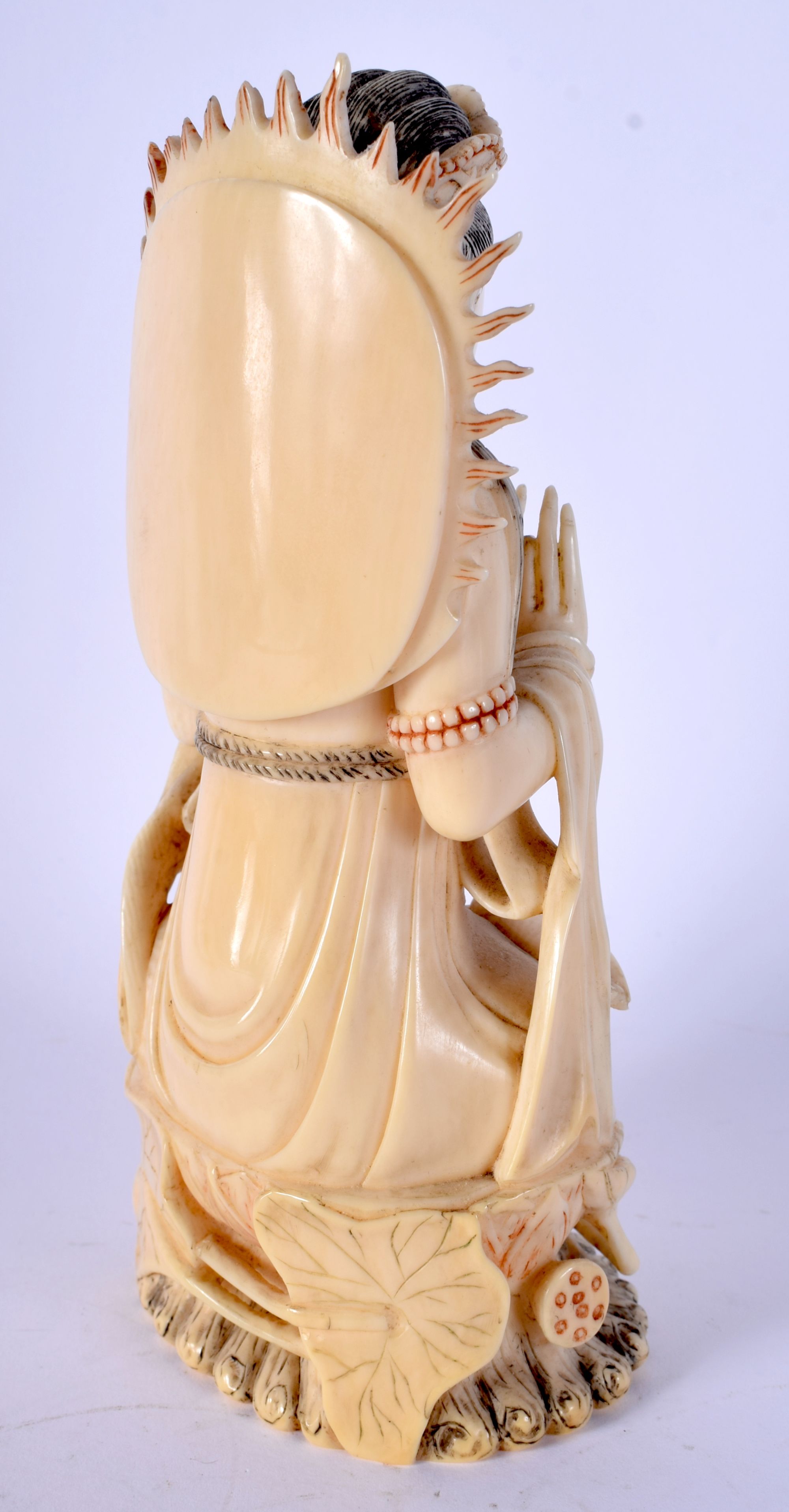 A 19TH CENTURY CHINESE POLYCHROMED IVORY FIGURE OF A SEATED DEITY modelled holding a censer. 16 cm x - Image 3 of 5