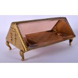 AN EARLY 20TH CENTURY FRENCH GILT METAL TRIANGULAR FORM JEWELLERY BOX formed with opposing ladies. 2