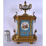 A 19TH CENTURY FRENCH SEVRES PORCELAIN AND BRONZE MANTEL CLOCK painted with figures and flowers. 42