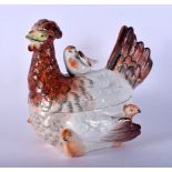 A LATE 18TH/19TH CENTURY ENGLISH POTTERY HEN BOX AND COVER of naturalistic form 18 cm x 14 cm.