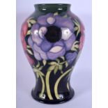 A MOORCROFT ANENOME TRIBUTE VASE C2003 by Emma Bossons & Louise Edwards. 24 cm high.