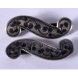 A PAIR OF RUSSIAN SILVER NIELLO PINS. 5.5 grams. 3.5 cm x 1.25 cm.