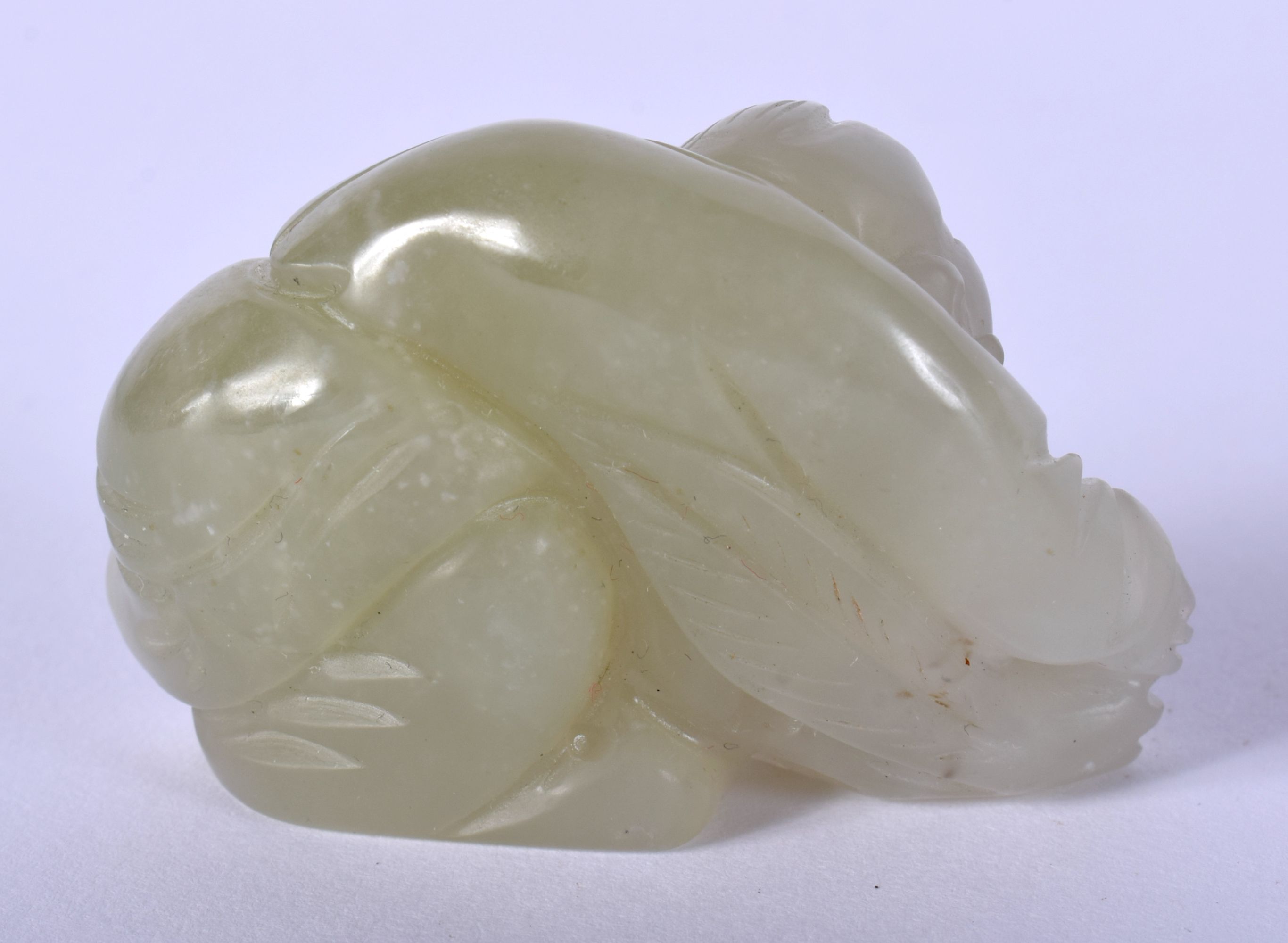 AN EARLY 20TH CENTURY CHINESE CARVED JADE FIGURE OF A BOY Late Qing/Republic. 5.5 cm x 3.5 cm. - Image 2 of 3