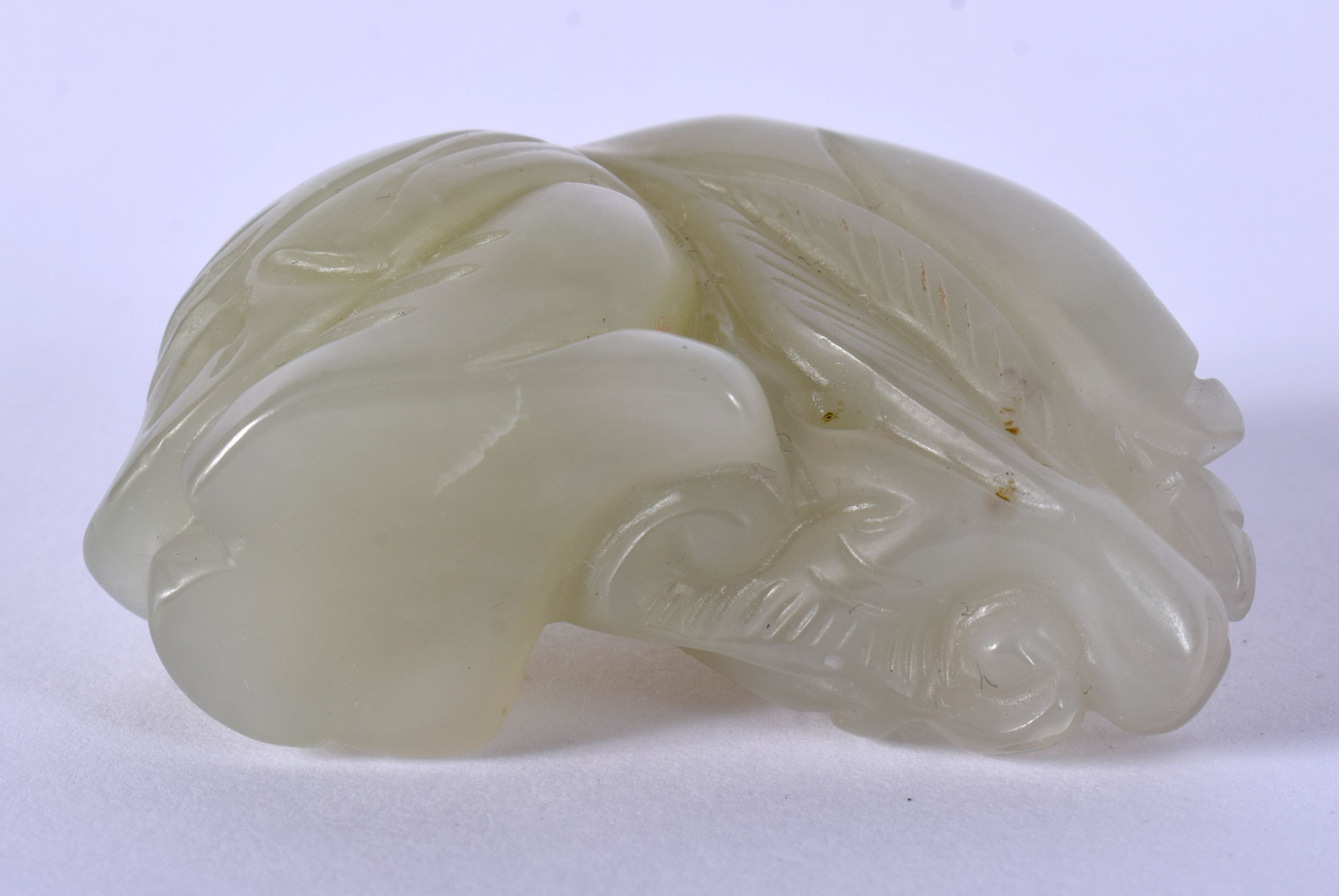 AN EARLY 20TH CENTURY CHINESE CARVED JADE FIGURE OF A BOY Late Qing/Republic. 5.5 cm x 3.5 cm. - Image 3 of 3