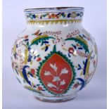 A RARE TURKISH IZNIK FAIENCE GLAZED KUTAHYA VASE painted with figures. 14 cm x 11 cm.