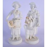 A PAIR OF 19TH CENTURY EUROPEAN PARIAN BISQUE GLAZED FIGURES modelled holding baskets and berries. 2