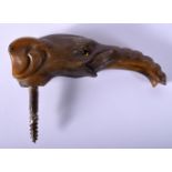 A 19TH CENTURY MIDDLE EASTERN CARVED RHINOCEROS HORN WALKING CANE HANDLE in the form of an elephant.