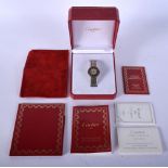 A BOXED CARTIER LADIES WRISTWATCH. 2.25 cm wide.