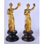 A PAIR OF EARLY 19TH CENTURY ENGLISH ORMOLU FIGURES OF MUSICIANS modelled upon wooden bases. 19 cm h