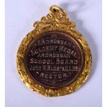 A 9CT GOLD MEDALLION. 9.5 grams. 4.5 cm x 3.25 cm.