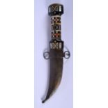 A VINTAGE MIDDLE EASTERN CARVED HORN HANDLED DAGGER with decorated blade. 27 cm long.