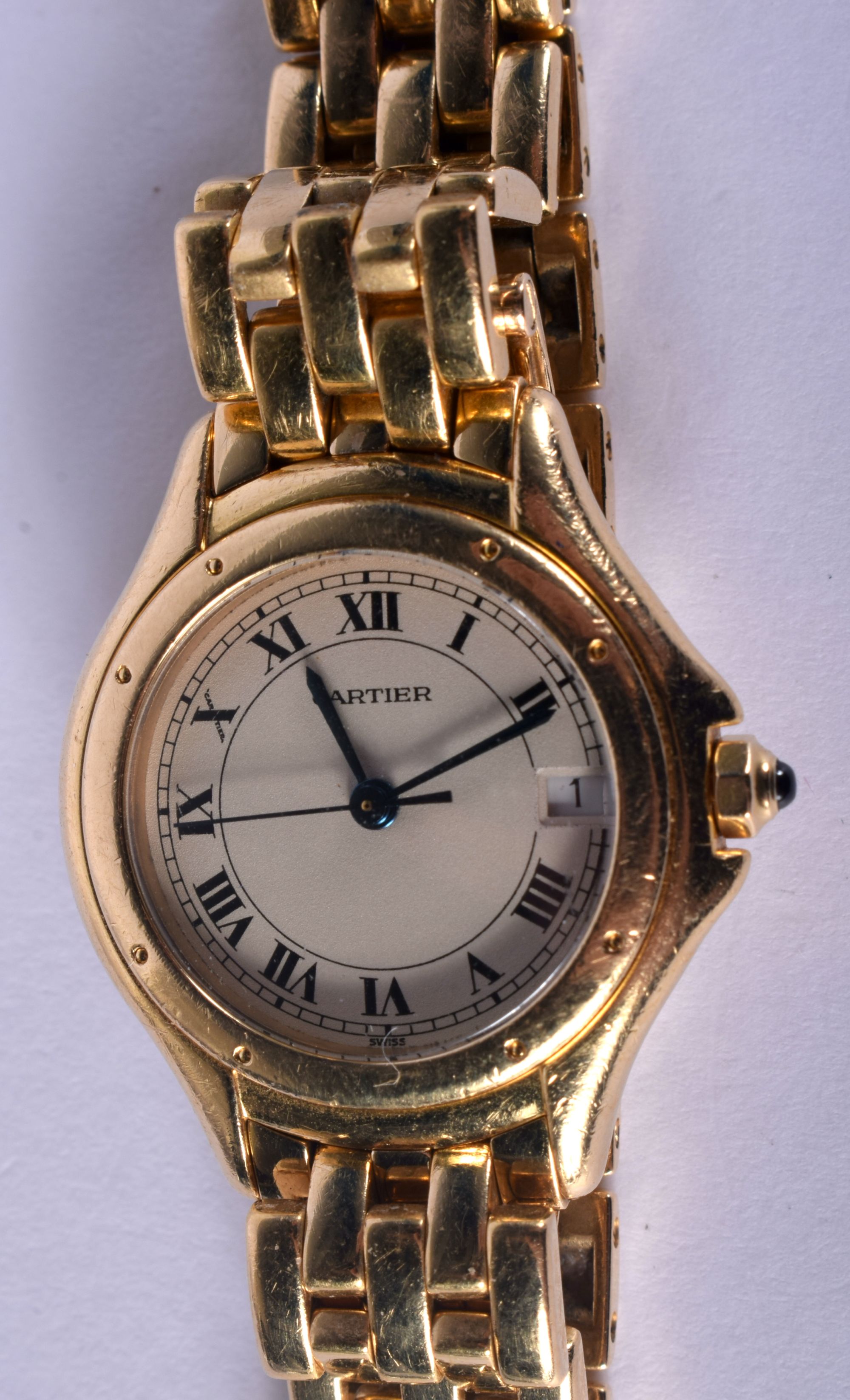 AN 18CT GOLD CARTIER WRISTWATCH with gold strap. 69 grams. Strap 10 cm long, dial 2.25 cm wide.