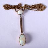 A VINTAGE 9CT GOLD AND OPAL NECKLACE. 2.8 grams. 44 cm long, pendant 4.75 cm x 1 cm.