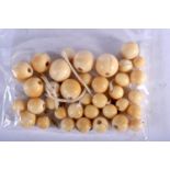 A QUANTITY OF BONE BEADS. Largest bead 15.8 mm. weight 51g. (qty)