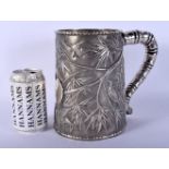 A VERY LARGE 19TH CENTURY CHINESE EXPORT SILVER TANKARD Qing, decorated with birds amongst bamboo sh