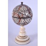 AN EARLY 20TH CENTURY CONTINENTAL CARVED IVORY GLOBE the top rising to reveal a sundial. 12 cm x 4 c