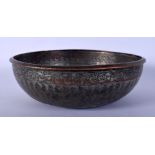 A PERSIAN COPPER ALLOY TINNED CALLIGRAPHY BOWL. 16 cm diameter.
