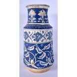 A TURKISH OTTOMAN BLUE AND WHITE FAIENCE IZNIK JAR painted with flowers. 27 cm high.