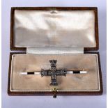 AN ANTQUE GOLD AND ENAMEL MILITARY CROSS PIN. 6.1 grams. 5 cm x 2 cm.