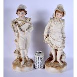 A LARGE PAIR OF ANTIQUE EUROPEAN BISQUE PORCELAIN FIGURES modelled as a boy and girl upon gilded bas