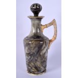 AN UNUSUAL ANTIQUE MARBLEISED EWER AND COVER with gilt handle. 18 cm high.