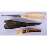 A VICTORIAN CARVED IVORY SHOE HORN together with a press corer and a shoe horn. (3)