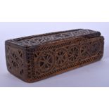 AN 18TH CENTURY EUROPEAN CARVED FRUITWOOD SLIDING BOX AND COVER decorated with circular motifs. 17 c