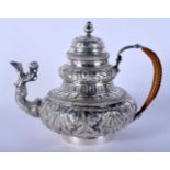 AN ANTIQUE DUTCH SILVER TEAPOT decorated with flowers. 567 grams. 20 cm x 18 cm.