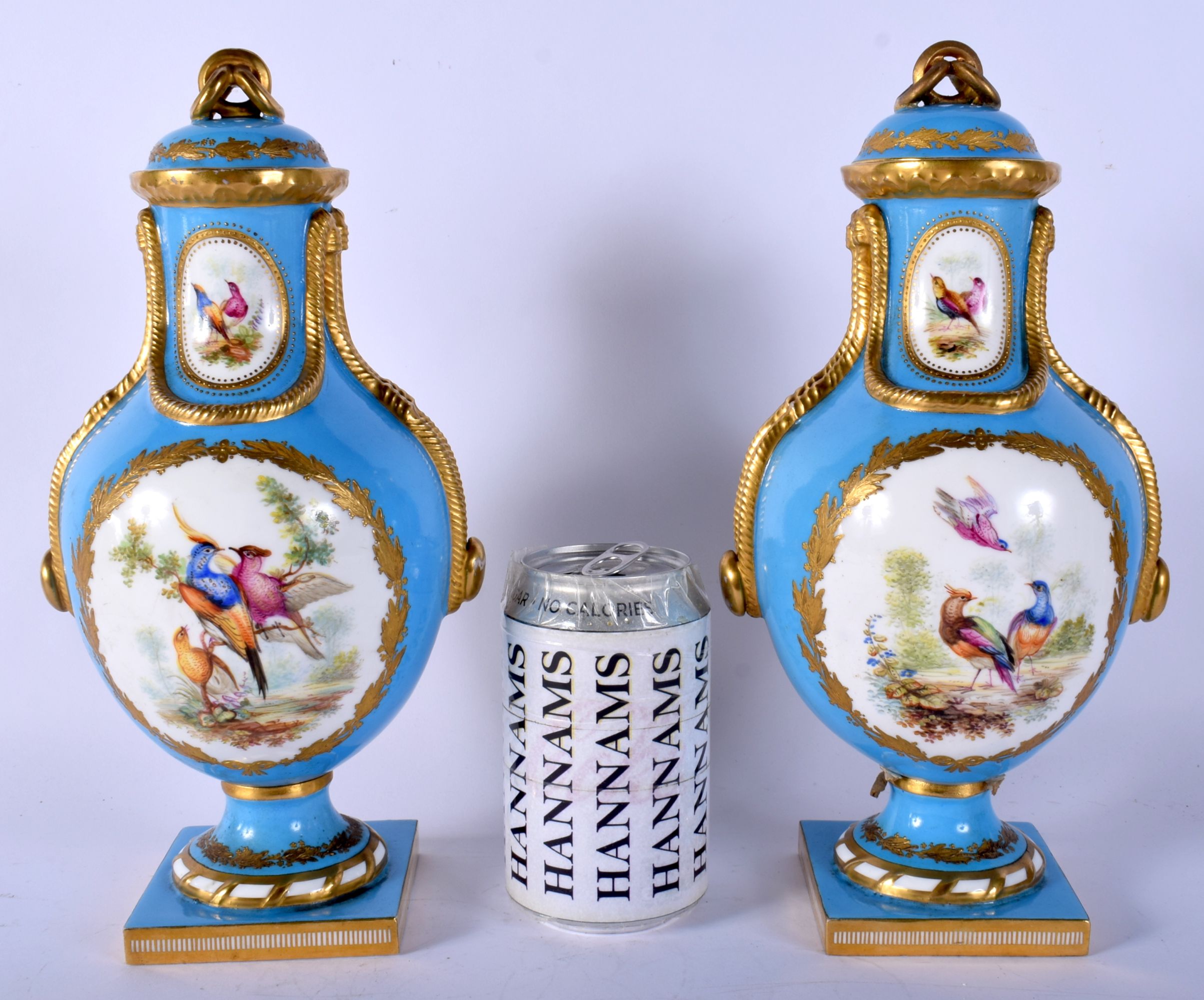 A GOOD PAIR OF 19TH CENTURY ENGLISH PORCELAIN SEVRES STYLE VASES AND COVERS Minton or Coalport, pain