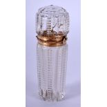 A FINE 19TH CENTURY FRENCH 18CT GOLD MOUNTED CRYSTAL GLASS SCENT BOTTLE with bird stopper. 9.5 cm hi