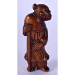 AN 18TH/19TH CENTURY JAPANESE EDO PERIOD CARVED BOXWOOD NETSUKE modelled as a male holding a staff.