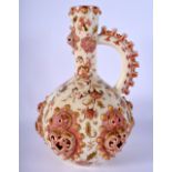 AN ANTIQUE HUNGARIAN ZSOLNAY PECS FAIENCE TYPE JUG. 28 cm high.