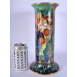 A FINE WEDGWOOD FAIRYLAND LUSTRE CYLINDRICAL VASE by Daisy Makeig Jones, painted with figures and la