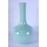 A CHINESE PALE BLUE GLAZED PORCELAIN VASE 20th Century. 25 cm high.