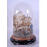 A FINE ANTIQUE GERMAN OBERSTEIN CARVED CRYSTAL GROTTO within a glass dome. 24 cm x 12 cm.