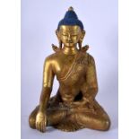 A 19TH CENTURY TIBETAN GILT BRONZE ALLOY METAL FIGURE OF A BUDDHA modelled holding a censer. 17 cm x