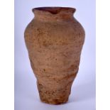 AN EARLY SOUTHERN EUROPEAN POTTERY VASE. 21 cm high.