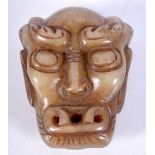 CHINESE JADE BELT HOOK CARVED WITH A DEMONFACE. 2.7cm x 6.2cm x 5.1cm, weight 84g