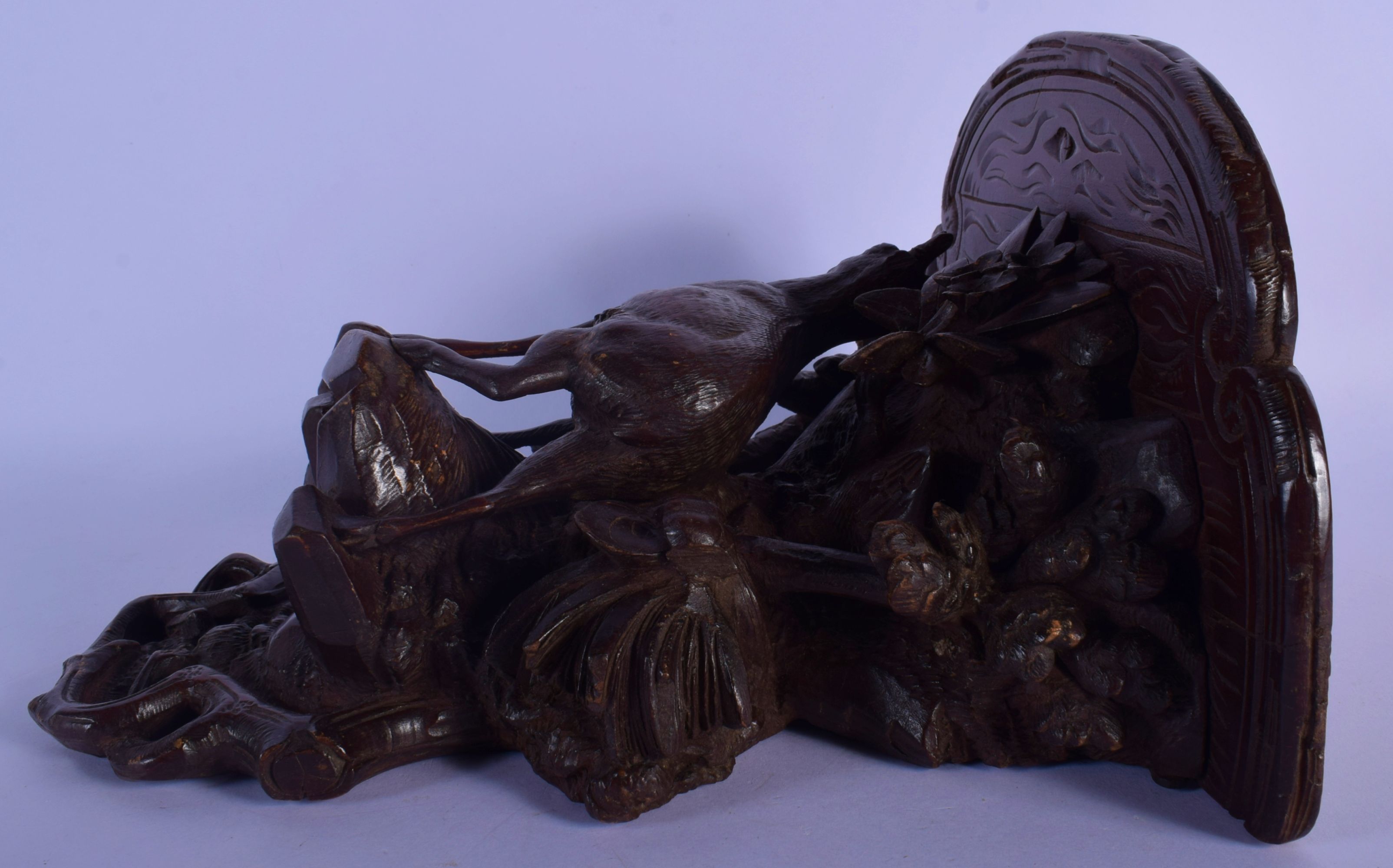 A 19TH CENTURY BAVARIAN BLACK FOREST WALL BRACKET modelled as a deer under foliage. 27 cm x 22 cm. - Image 3 of 6