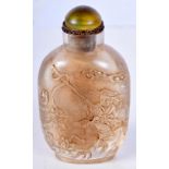 A CHINESE CARVED ROCK CRYSTAL SNUFF BOTTLE. 9cm x 5cm x 3cm, weight 137g