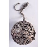 A CHINESE WHITE METAL INCENSE BURNER IN THE FORM OF A HANGING BALL. 5.2cm diameter, weight 65g