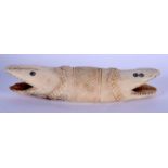 A VERY UNUSUAL 19TH CENTURY NORTH AMERICAN TRIBAL INUIT DOUBLE HEADED BONE SALMON AMULET possibly a