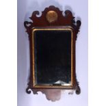 A GEORGE II STYLE GILTWOOD HANGING MIRROR with gilded shell inset decoration. 66 cm x 44 cm.