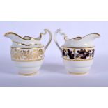 18TH C. FLIGHT BARR WORCESTER CREAM JUGS ONE WITH BROWN LEAVES AND THE OTHER WITH ELABORATE GILT DEC