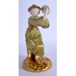 ROYAL WORCESTER FIGURE OF A GIRL PLAYING THE TAMBOURINE DECORATED IN SHOT GOLD. 14cm high