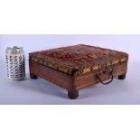 A RARE 19TH CENTURY PERSIAN RUG OVERLAID FOOT WARMER with rising top. 27 cm square.